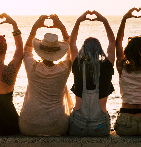 group observing the sunset